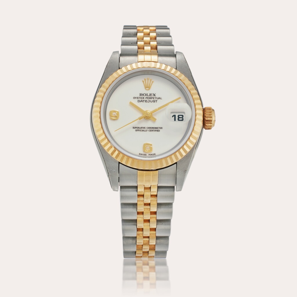 View full screen - View 1 of Lot 415. Rolex Award 2004: Reference 79173 Datejust | A stainless steel and yellow gold automatic wristwatch with date, bracelet and cacholong and diamond-set dial, Circa 2002.