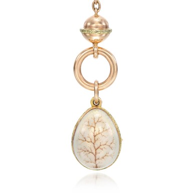 View full screen - View 1 of Lot 409. A Fabergé varicoloured gold and guilloché enamel egg pendant locket, workmaster Henrik Wigström, St Petersburg, 1904-1908.