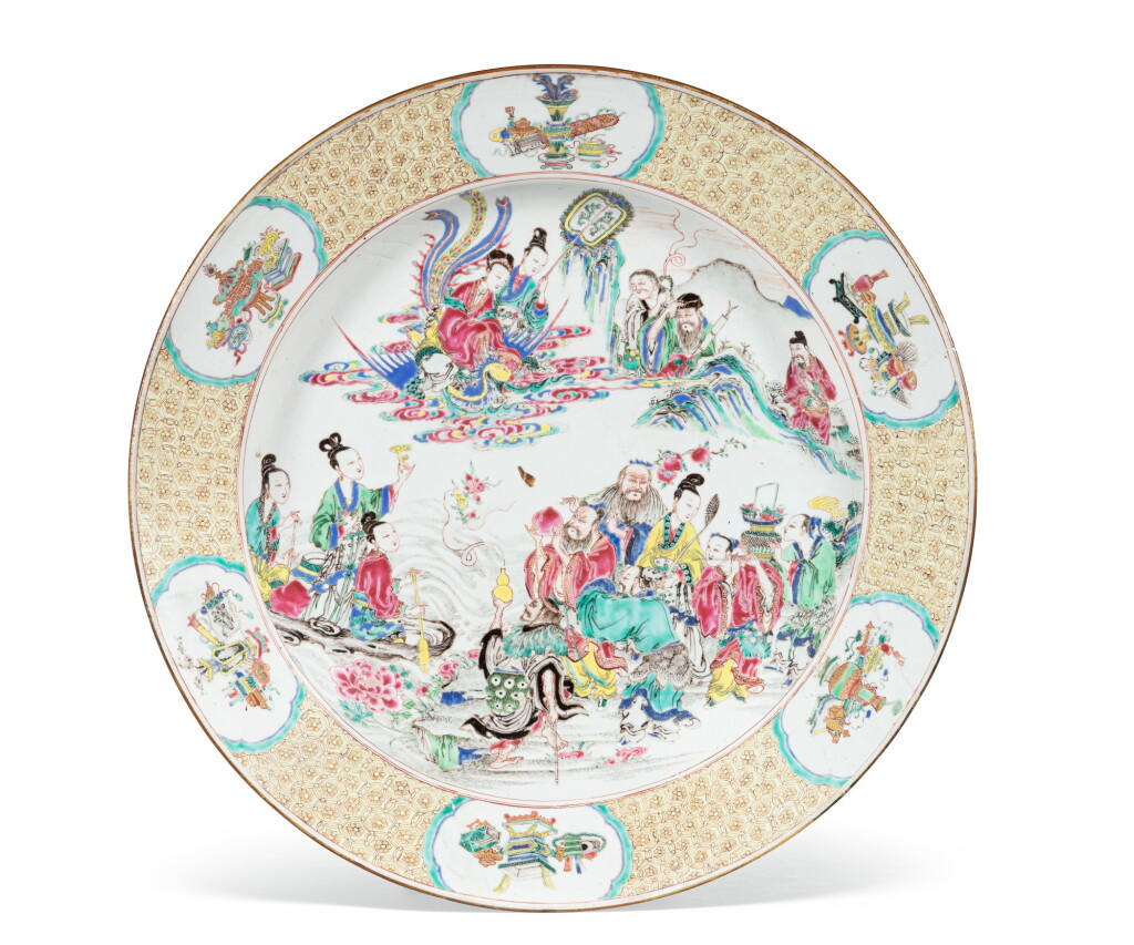 View full screen - View 1 of Lot 15. A large famille rose 'Eight Immortals' dish Qing dynasty, 18th century | 清十八世紀 粉彩群仙祝壽圖折沿大盤.
