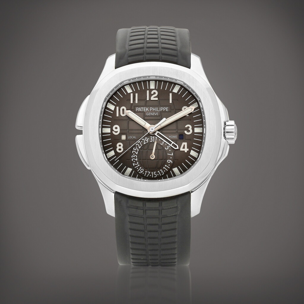 View full screen - View 1 of Lot 2152. Aquanaut Travel Time, Reference 5164 | A stainless steel dual time zone wristwatch with date and day and night indication, Circa 2012 | 百達翡麗 | AQUANAUT TRAVEL TIME 型號5164 | 精鋼兩地時間腕錶,備日期及晝夜顯示,約2012年製.