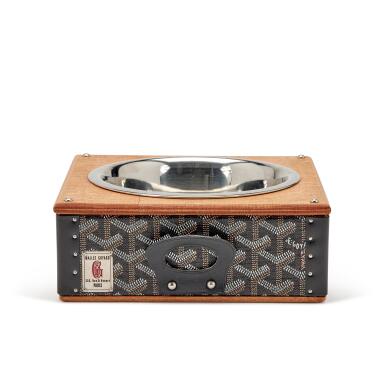 View full screen - View 1 of Lot 138. Black Goyardine Canvas and Clamecy Cowhide, Beechwood, and Palladium Edmond Single Pet Bowl, 2006.