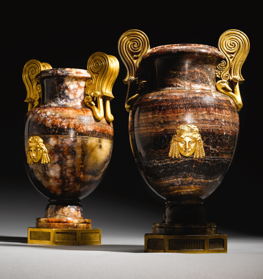 View full screen - View 1 of Lot 29. A pair of late George III ormolu-mounted blue-john vases, Circa 1802, the mounts attributed to Alexis Decaix.