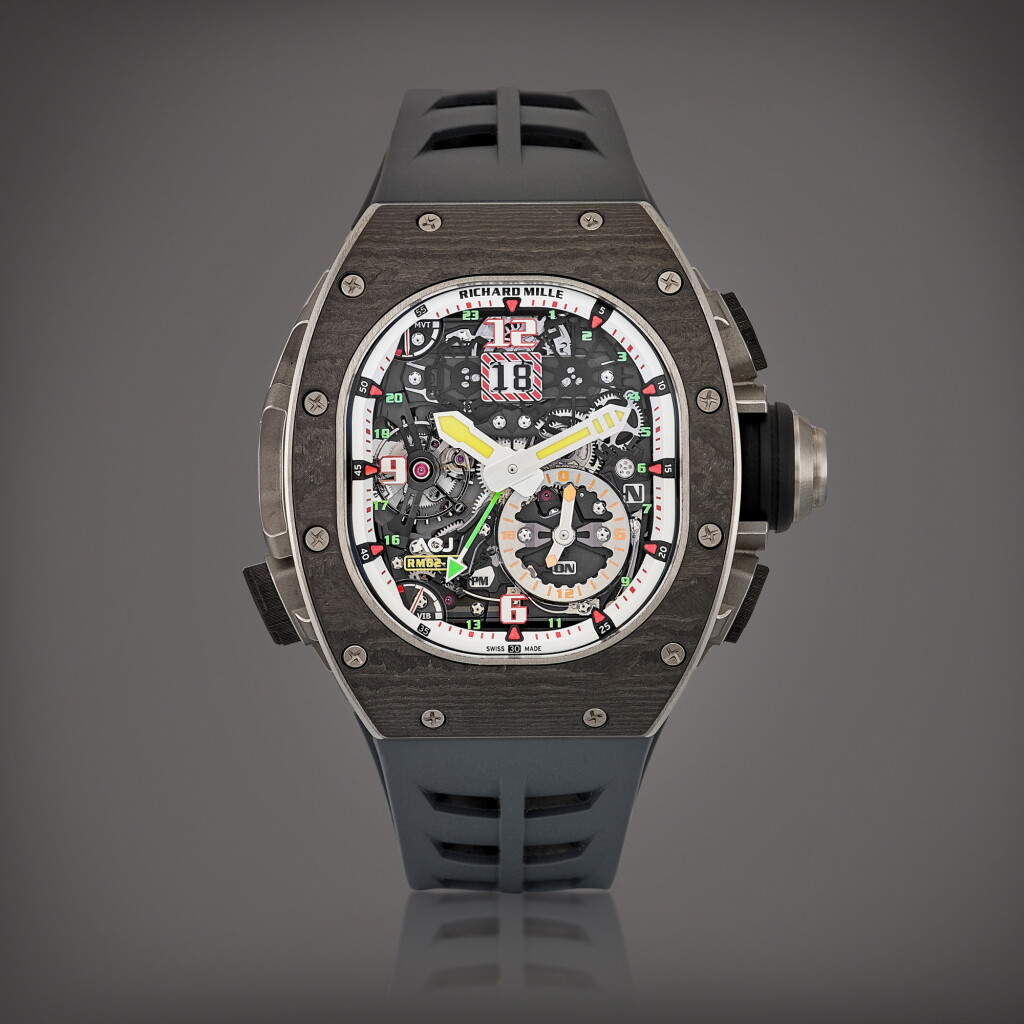 View full screen - View 1 of Lot 2296. Reference RM62-01 | A limited edition titanium and carbon fibre skeletonised tourbillon dual time wristwatch with date, vibrating alarm and power reserve indication, Circa 2021 | Richard Mille | 型號RM62-01 | 限量版鈦金屬及碳纖維鏤空陀飛輪兩地時間腕錶,備日期、震動鬧鈴裝置及動力儲備顯示,約2021年製.