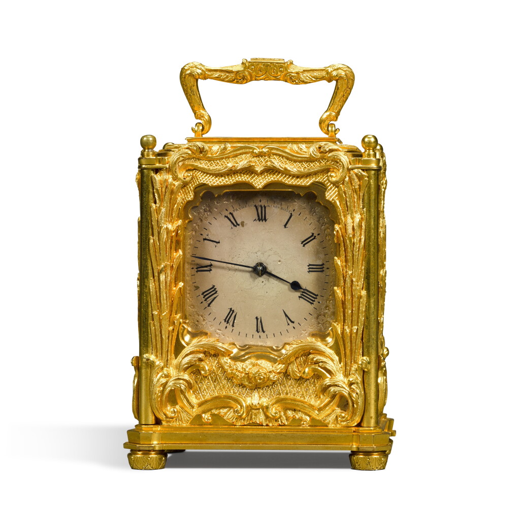 View full screen - View 1 of Lot 87. A Victorian engraved gilt-brass and lapis lazuli carriage timepiece in the manner of Thomas Cole, circa 1860.