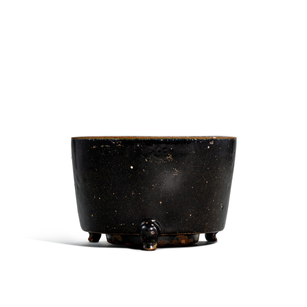View full screen - View 1 of Lot 3321. A black-glazed incense burner, Song - Yuan dynasty | 宋至元 黑釉三足爐.