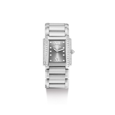 View full screen - View 1 of Lot 864. PATEK PHILIPPE | TWENTY~4, REFERENCE 4910/20, A WHITE GOLD AND DIAMOND-SET WRISTWATCH WITH BRACELET, CIRCA 2002.