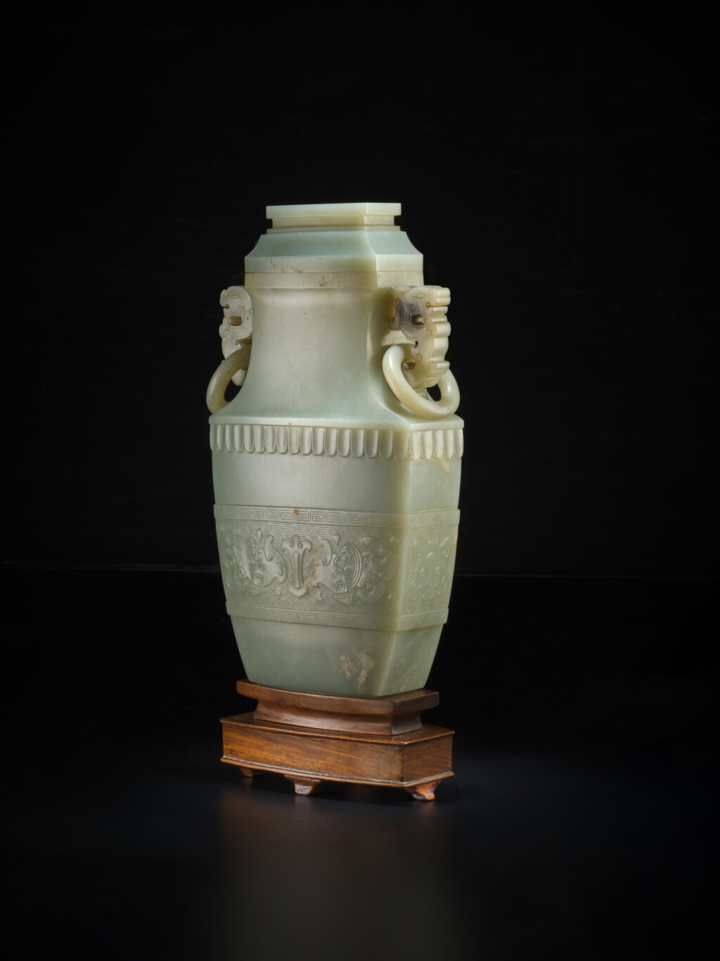 View full screen - View 1 of Lot 110. A large celadon jade archaistic vase and cover, Qing dynasty, 18th / 19th century | 清十八 / 十九世紀 青玉仿古蓋瓶.