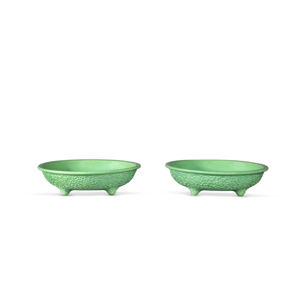 View full screen - View 1 of Lot 14. A rare pair of carved green-glazed 'lotus' narcissus trays, Seal marks and period of Qianlong .
