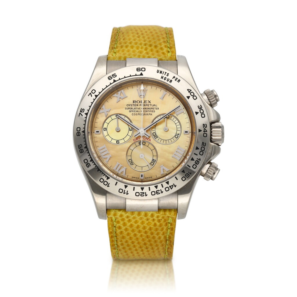 View full screen - View 1 of Lot 26. Daytona 'Beach', Ref. 116519 | A white gold chronograph wristwatch with yellow mother-of-pearl dial | Circa 2001.