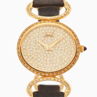 View full screen - View 1 of Lot 171. Reference 9802 D B | A yellow gold and diamond-set wristwatch, Circa 1970.