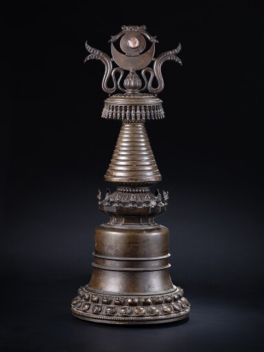 View full screen - View 1 of Lot 3. A large gem-inset copper-alloy Mahaparinirvana stupa, Tibet, circa 13th century.