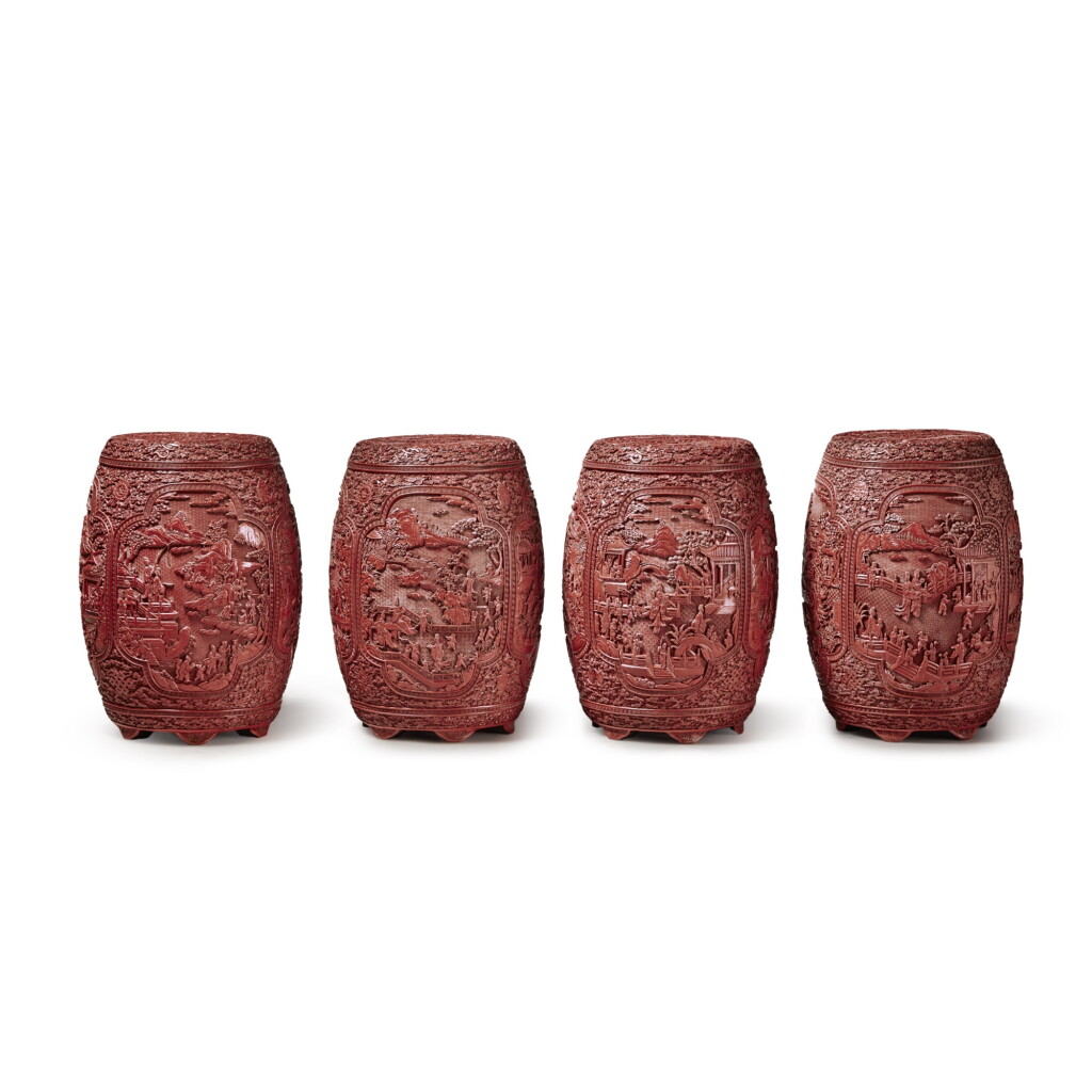 View full screen - View 1 of Lot 233. A set of four carved cinnabar lacquer 'children at play' garden seats, Qing dynasty, 18th / 19th century | 清十八 / 十九世紀 剔紅雲龍紋開光山水人物圖坐墩一套四件.