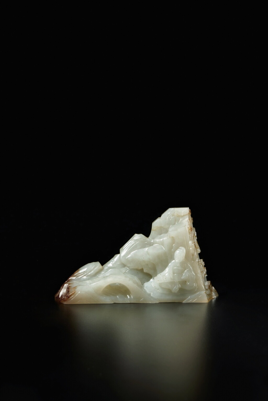 View full screen - View 1 of Lot 77. A white and russet jade boulder, Qing dynasty, Qianlong period.