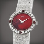 Reference 9804 A6 | A white gold, diamond and ruby-set bracelet watch with rhodonite dial | Circa 1970