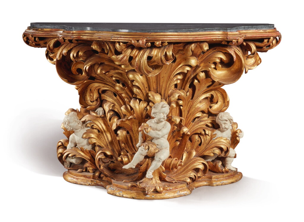View full screen - View 1 of Lot 126. AN ITALIAN BAROQUE CARVED, WHITE PAINTED, AND GILTWOOD CONSOLE, CIRCA 1700.