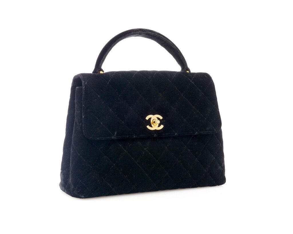 View full screen - View 1 of Lot 20. Black velvet and gold-tone metal top handle handbag.
