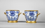 A Pair of Late Louis XIV Gilt-Bronze Mounted Blue and White Porcelain Cache-Pots, the Porcelain Kangxi (1662-1722), the Mounts Circa 1715