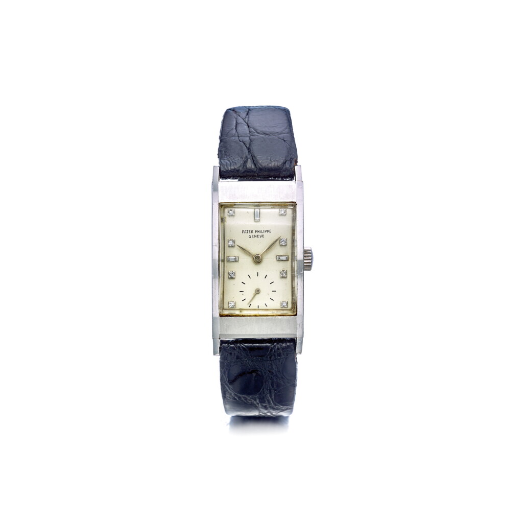 View full screen - View 1 of Lot 914. PATEK PHILIPPE | REF 425 'TEGOLINO', A PLATINUM RECTANGULAR WRISTWATCH, MADE IN 1948 | 百達翡麗 | 425型號「TEGOLINO」鉑金腕錶,1948年製.