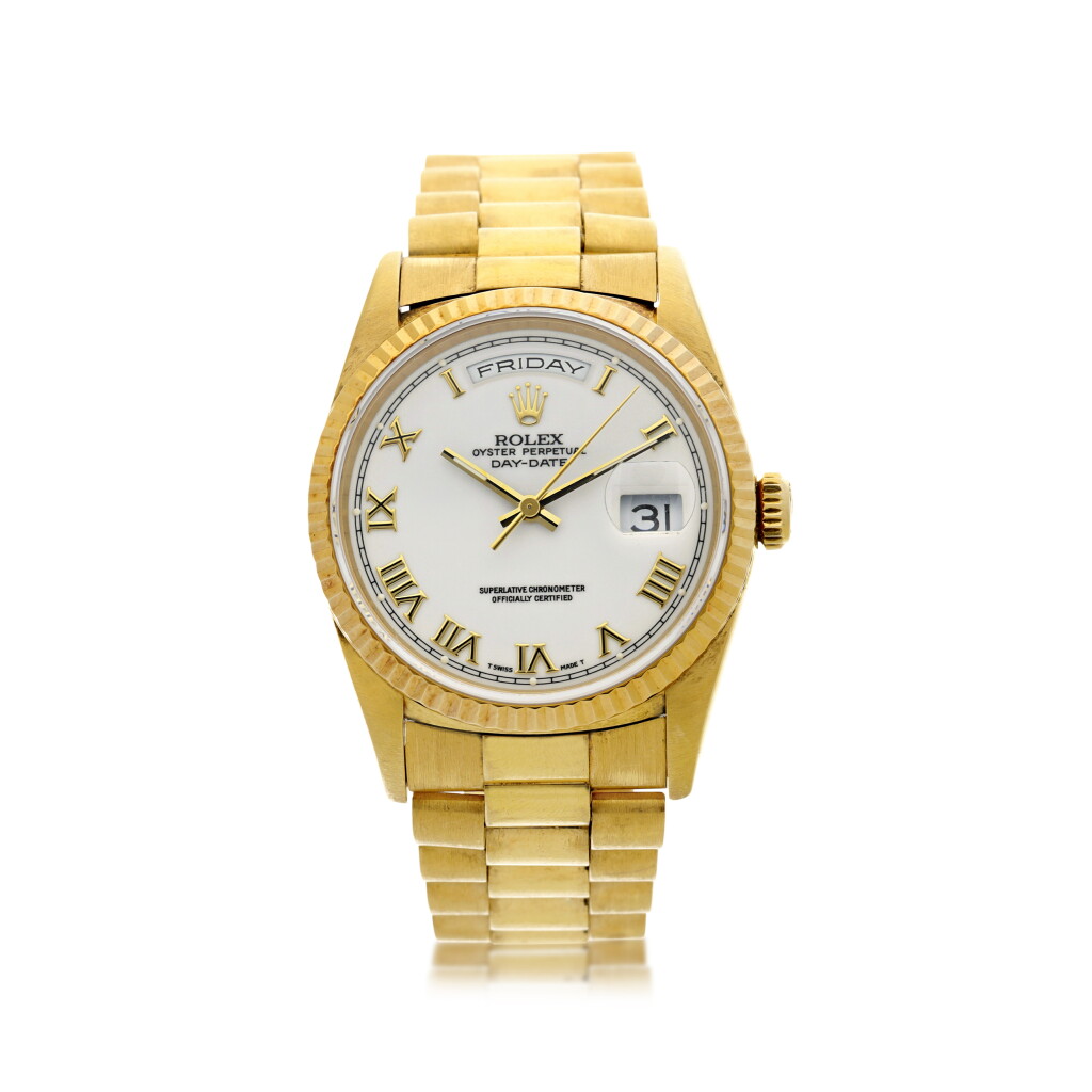 View full screen - View 1 of Lot 48. REFERENCE 18238/18200 DAY-DATE A YELLOW GOLD AUTOMATIC WRISTWATCH WITH DAY, DATE AND BRACELET, CIRCA 1994.