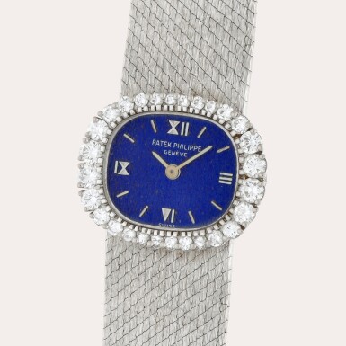 View full screen - View 1 of Lot 307. Reference 3394/1G | A white gold and diamond-set bracelet watch | Circa 1973.
