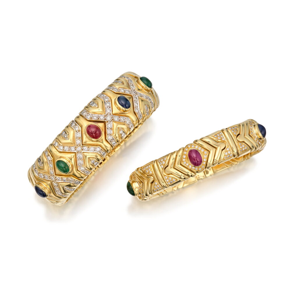 View full screen - View 1 of Lot 81. Two Gold, Gem-Set and Diamond Cuff-Bracelets.