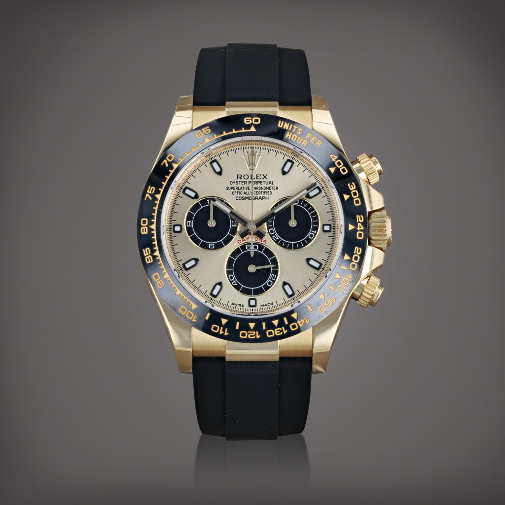 View full screen - View 1 of Lot 615. Daytona 'stickered', reference 116518LN Montre bracelet chronographe en or jaune | Yellow gold chronograph wristwatch with bracelet Vers 2022 | Circa 2022.