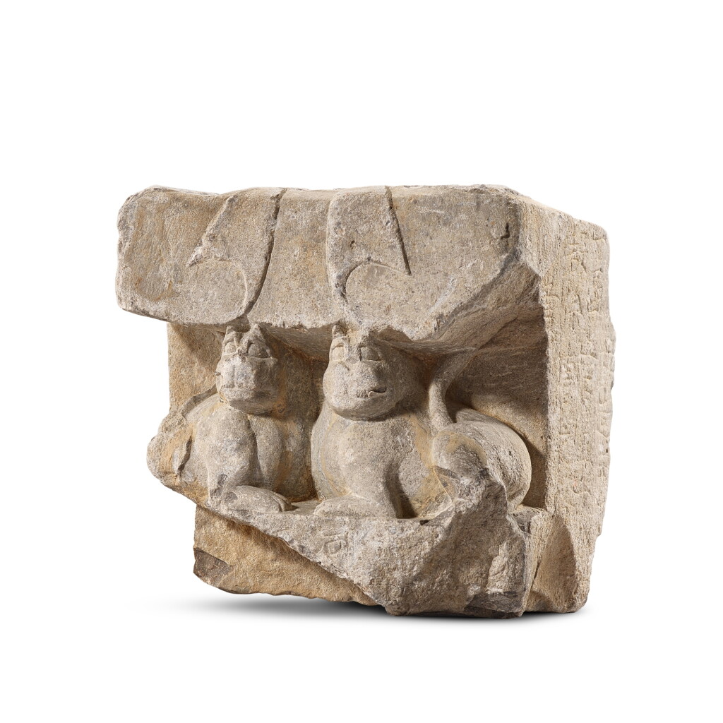 View full screen - View 1 of Lot 539. An inscribed grey limestone votive stele, Northern Qi dynasty, dated to AD 575 北齊 武平六年銘(575年) 灰石雙獅幢台.