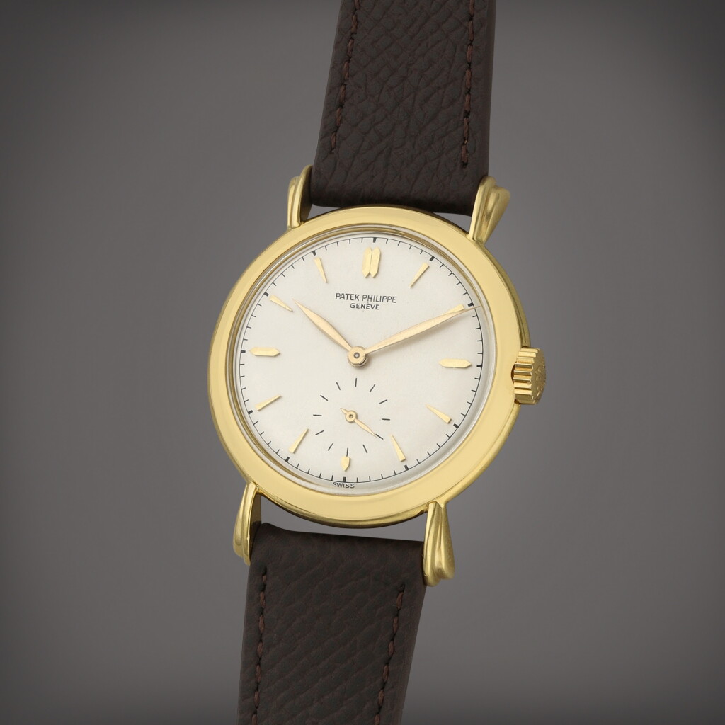 View full screen - View 1 of Lot 54. Reference 2453 | A yellow gold wristwatch | Circa 1951.