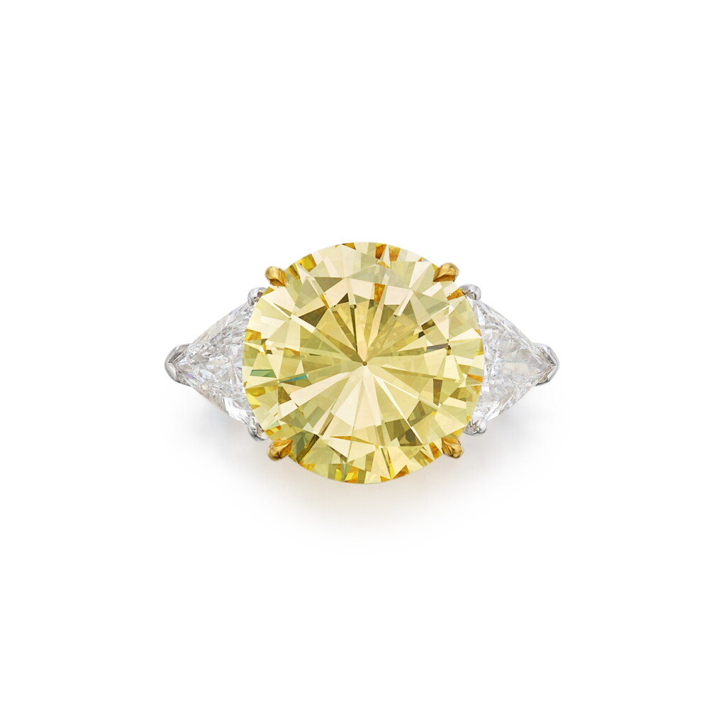 View full screen - View 1 of Lot 530. Fancy Intense Yellow diamond ring.