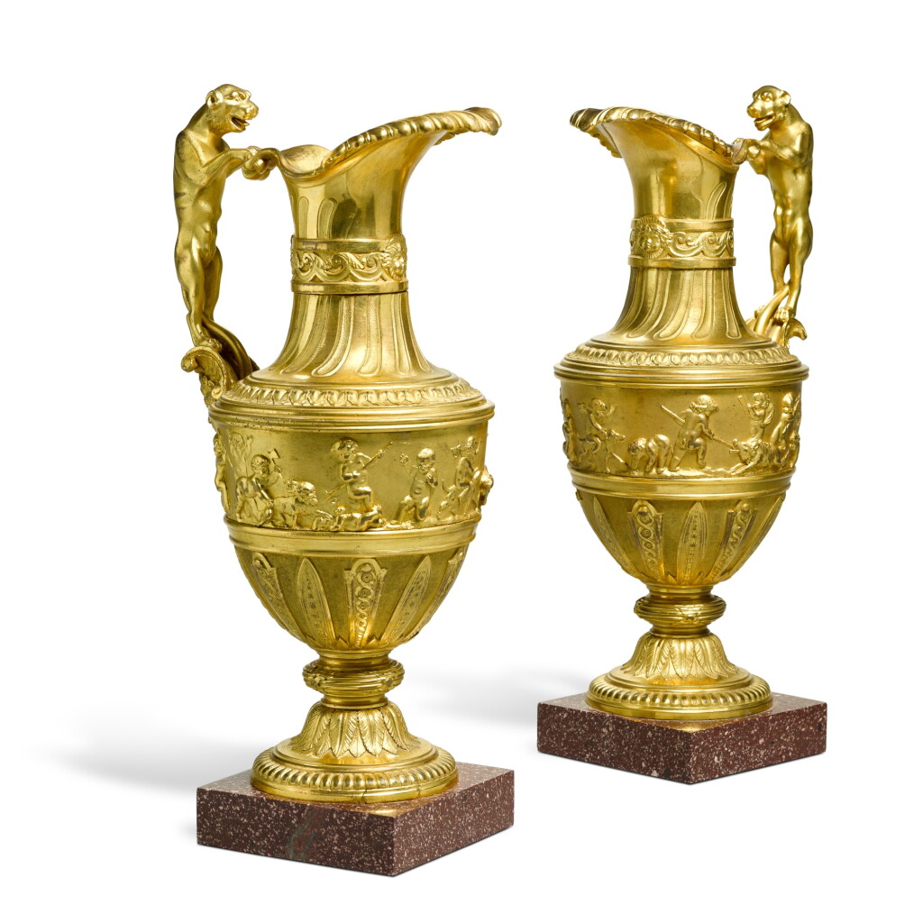 View full screen - View 1 of Lot 170. A pair of Louis XIV style gilt-bronze ewers, after the model by Nicolas Delaunay, first half 19th century.