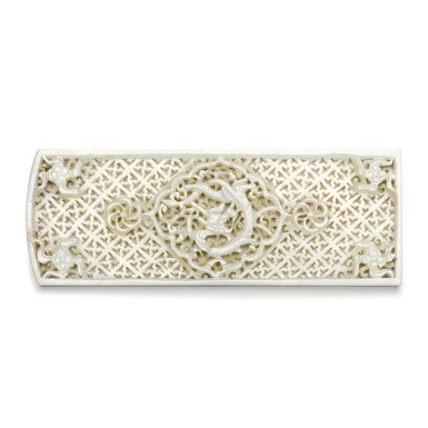 View full screen - View 1 of Lot 260. A reticulated pale celadon jade 'dragon' belt plaque, Ming dynasty | 明 青白玉鏤雕龍紋帶板.