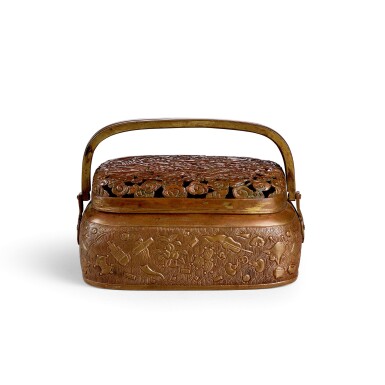 View full screen - View 1 of Lot 3677. A rare parcel-gilt copper alloy rectangular bronze handwarmer By Hu Wenming, Late Ming dynasty | 明末 胡文明製局部鎏金銅鏤空祥雲龍鳳紋手爐 《胡文明製》款.