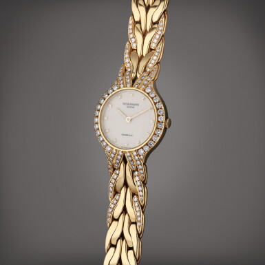 View full screen - View 1 of Lot 101. Reference 4816/3 La Flamme | Retailed by Tiffany & Co.: A yellow gold and diamond-set bracelet watch, Circa 1995.