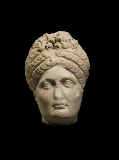 View full screen - View 1 of Lot 44. A Roman Marble Portrait Head of a Woman, Trajanic, early 2nd Century A.D..