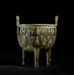 A superb inscribed archaic bronze 'animal mask' food vessel (ding), Shang dynasty, 12th century BC 商公元前十二世紀 青銅獸面紋鼎
