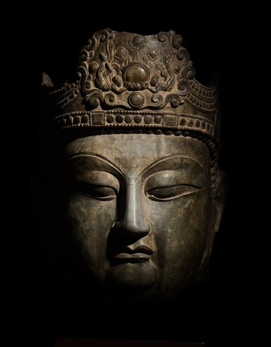 View full screen - View 1 of Lot 3614. A monumental and extremely rare limestone head of Vairocana Buddha, Tang dynasty | 唐 石灰岩雕寶冠佛首.