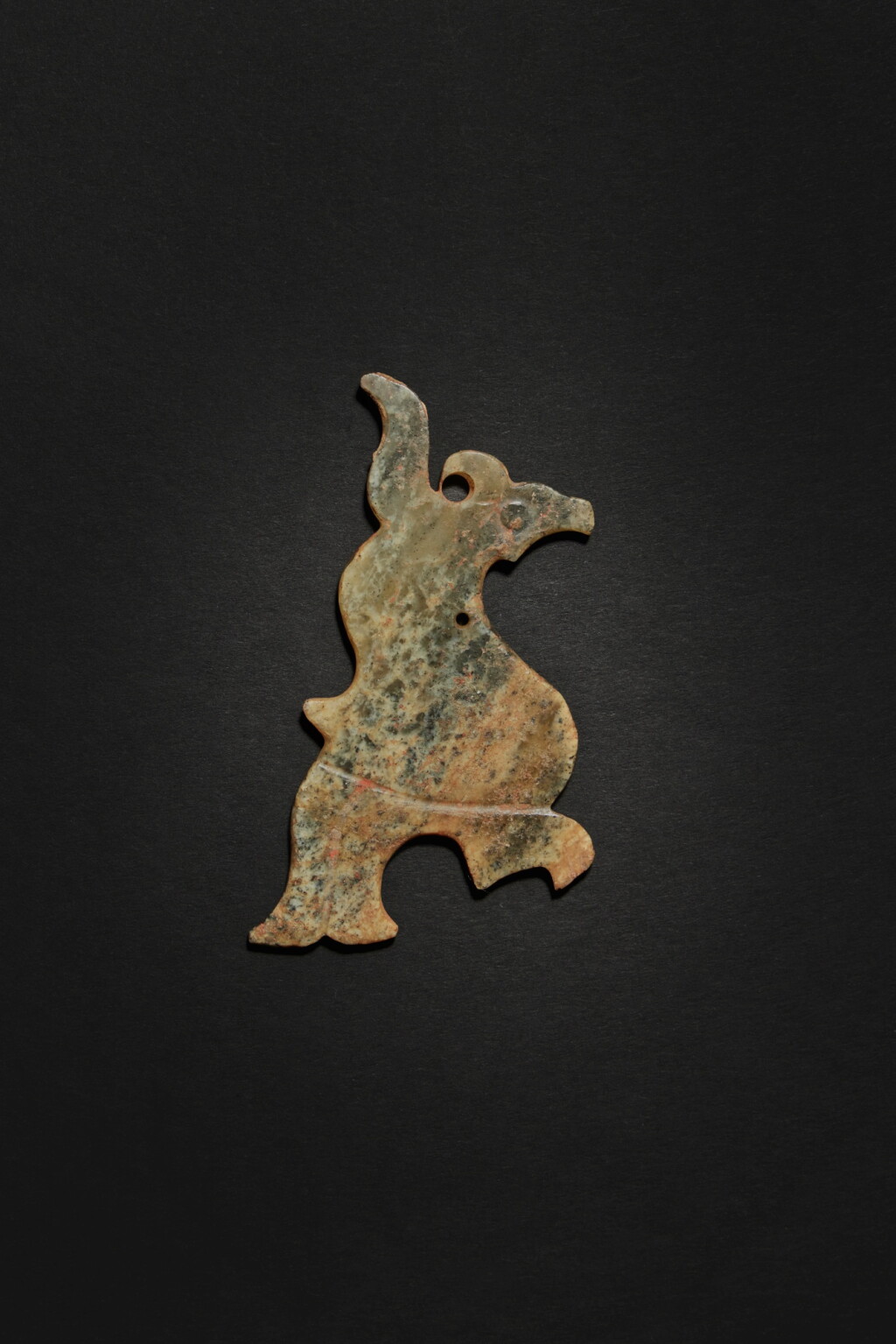 View full screen - View 1 of Lot 37. An archaic jade bird-form pendant, Western Zhou dynasty.