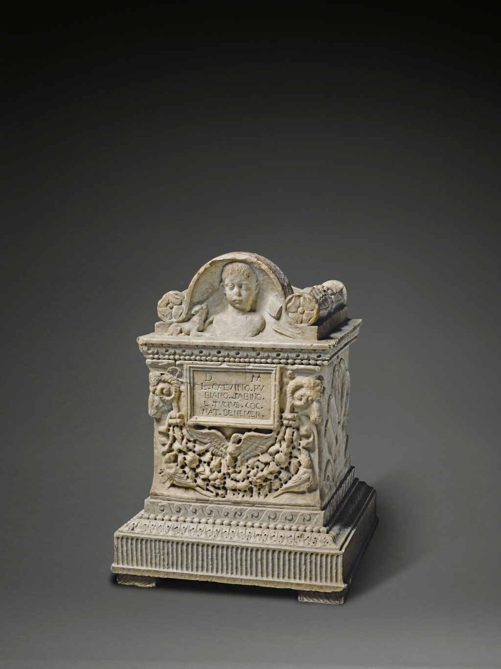 View full screen - View 1 of Lot 104. A Roman Marble Cinerary Urn inscribed for Lucius Calvinus Pubianus Sabinus, circa late 1st Century A.D., engraved and restored by Gianbattista Piranesi (1720-1778).