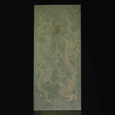 View full screen - View 1 of Lot 167. An imperial green jade book cover, Qing dynasty, Qianlong period | 清乾隆 青玉填金雙龍戲珠紋冊頁.