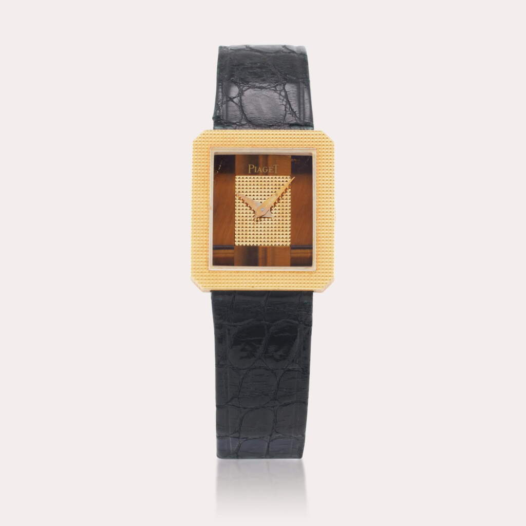 View full screen - View 1 of Lot 287. Reference 41544 | A yellow gold square wristwatch with tiger’s eye dial, Circa 1980.