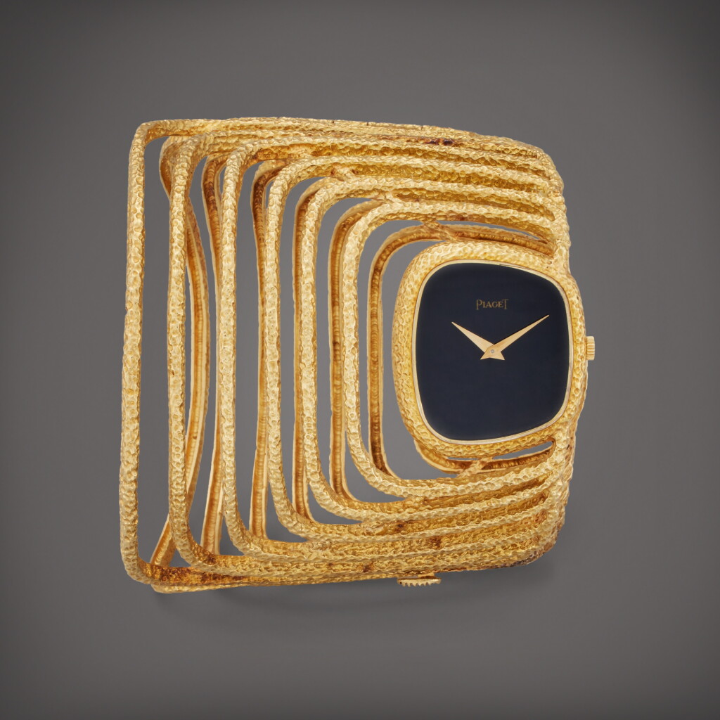 View full screen - View 1 of Lot 125. Reference 9467 D 59 | A yellow gold and onyx cuff watch, Circa 1970.