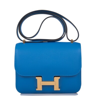 View full screen - View 1 of Lot 14. HERMÈS | BLEU ZANZIBAR CONSTANCE 18CM OF EVERCOLOR LEATHER WITH GOLD HARDWARE.