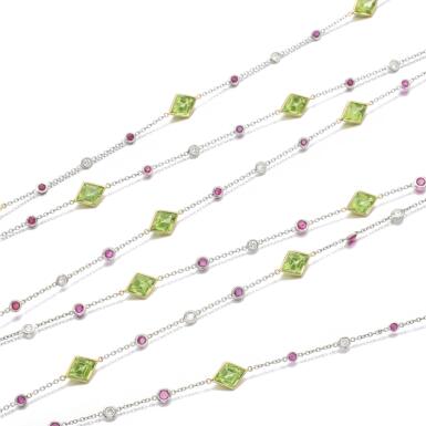 View full screen - View 1 of Lot 253. PERIDOT, RUBY AND DIAMOND LONG CHAIN.