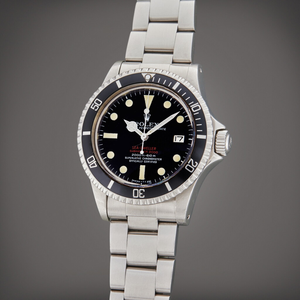 View full screen - View 1 of Lot 116. Reference 1665 Double Red Sea-Dweller | A stainless steel automatic wristwatch with date and bracelet, Circa 1973.