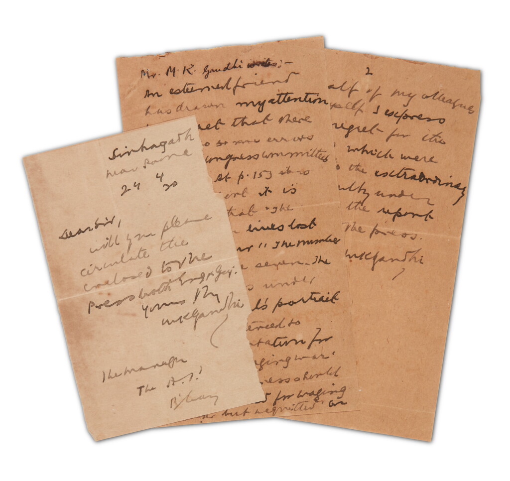 View full screen - View 1 of Lot 186. M.K. Gandhi | autograph note signed, on the Congress Report on the Amristar Massacre , 24 April 1920, with cover letter.