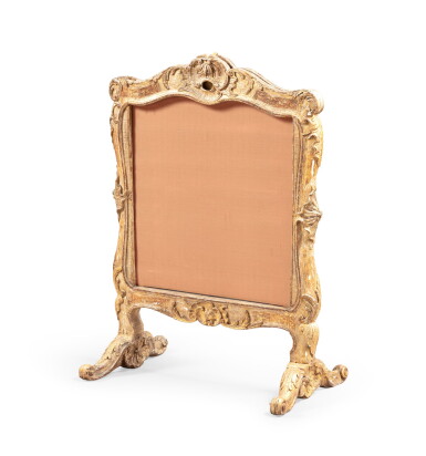 View full screen - View 1 of Lot 74. A Louis XV carved giltwood fire screen, circa 1740-1750 | Ecran de cheminée en bois sculpté et doré d'époque Louis XV, vers 1740-1750.