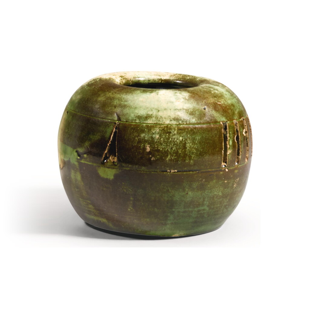 View full screen - View 1 of Lot 236. A GREEN AND RUSSET-GLAZED HAND WARMER TANG DYNASTY | 唐 褐綠釉暖手爐.