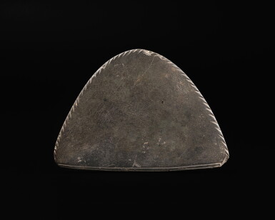View full screen - View 1 of Lot 128. An Egyptian Greywacke Cosmetic Palette, late Predynastic Period/ 1st Dynasty, circa 3200-2900 B.C..
