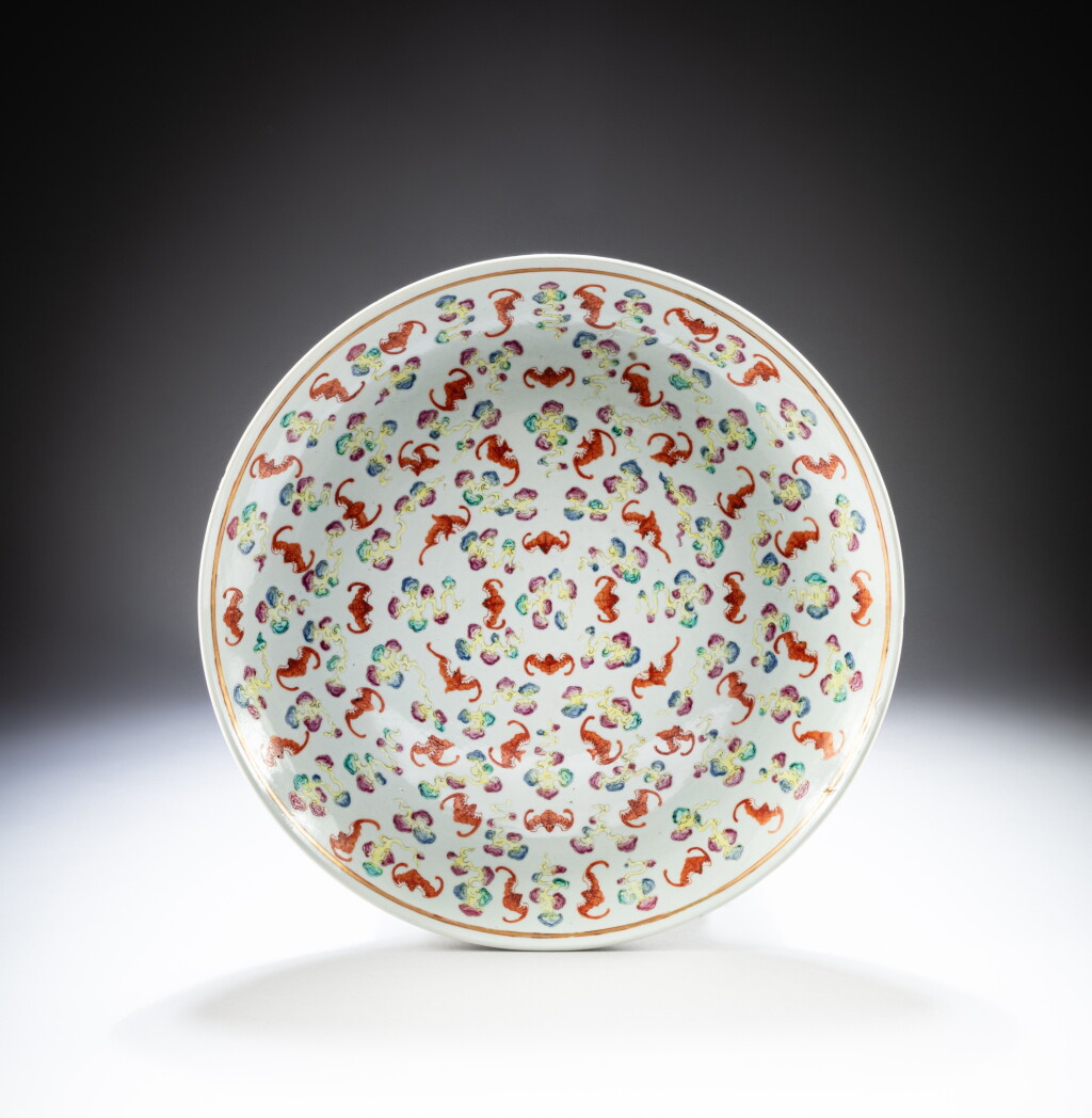 View full screen - View 1 of Lot 72. A large famille-rose 'hundred bats' dish, Qing dynasty, mark and period of Guangxu | 清光緒 粉彩雲蝠紋大盤.
