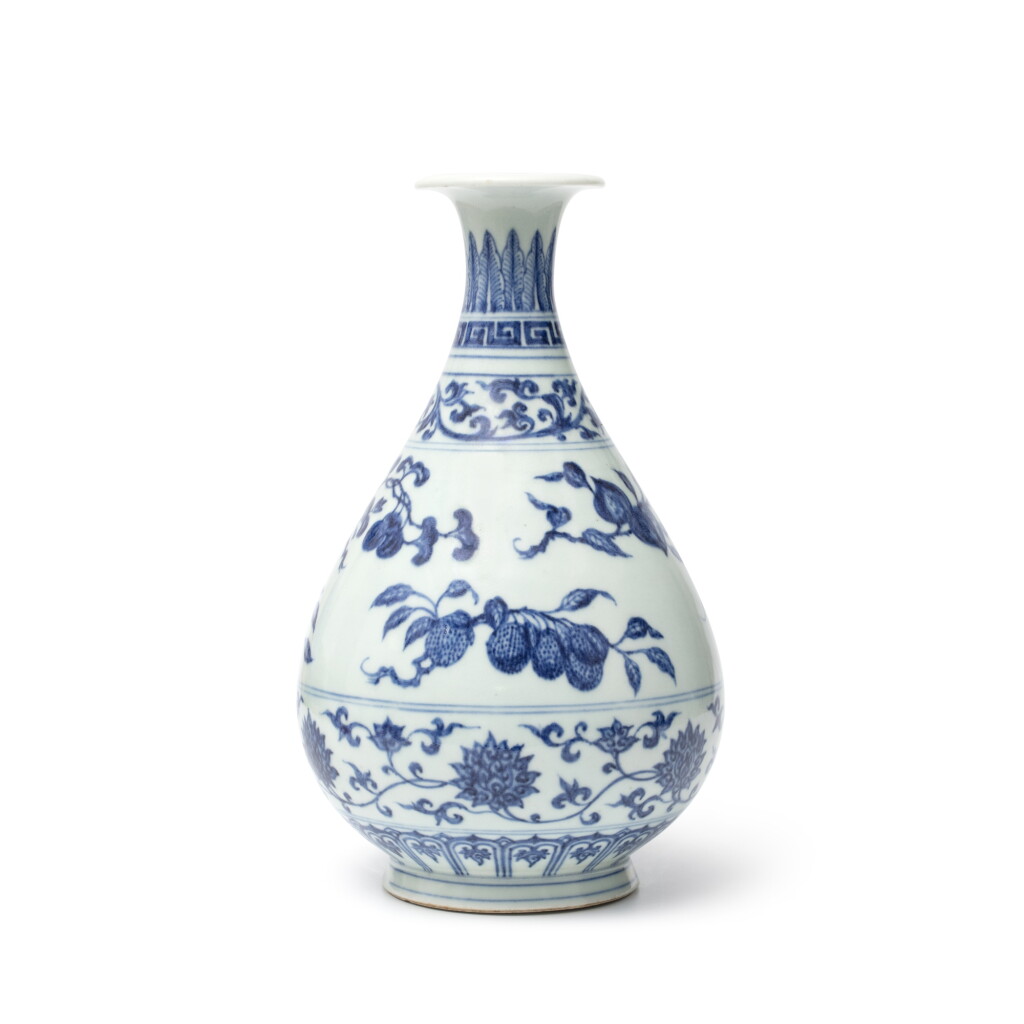 View full screen - View 1 of Lot 74. A blue and white 'fruit' vase (Yuhuchunping), Qing dynasty, Yongzheng period.